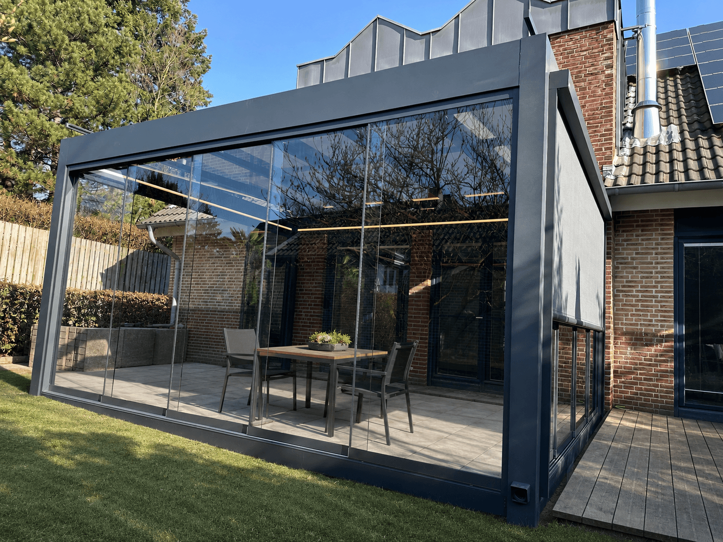 Glasschiebewände an einer realen Terrasse in NRW